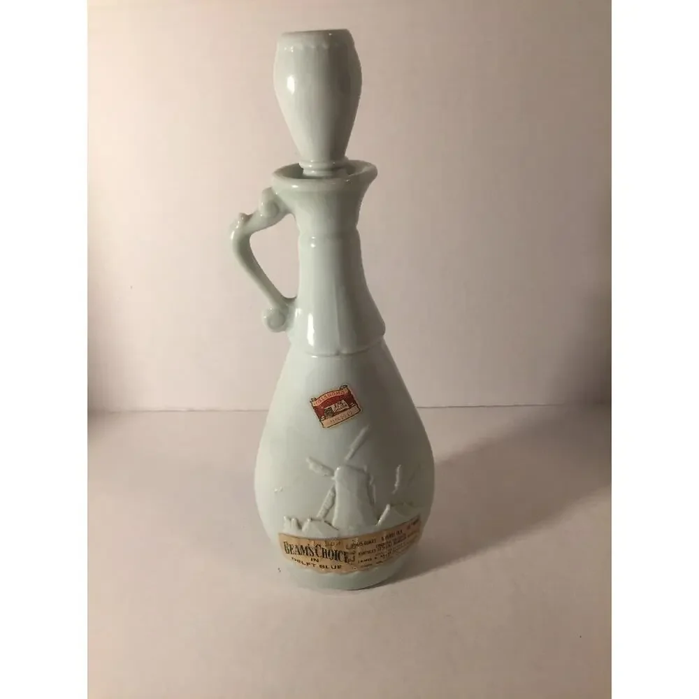 Vintage 1963 Jim Beam white milkglass decanter with blue ships and windmill. 13